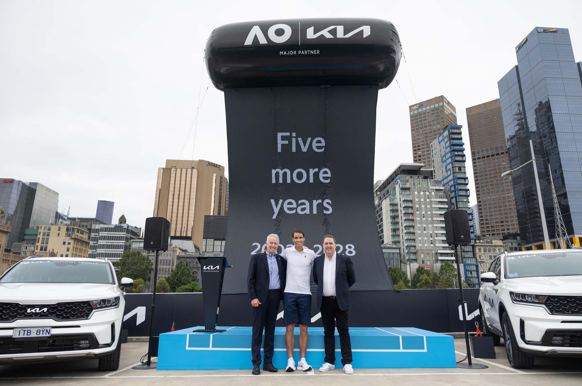 Rafael Nadal officially handed over the 130-strong Kia fleet at Federation Square this morning ahead of Australian Open 2023. Nadal will be joined by Australian Open Tournament Director Craig Tiley and Kia Australia Chief Operating Officer Damien Meredith on {iptcdow}, {iptcmonthname} {iptcday}, {iptcyear4}. MANDATORY PHOTO CREDIT Tennis Australia/ FIONA HAMILTON